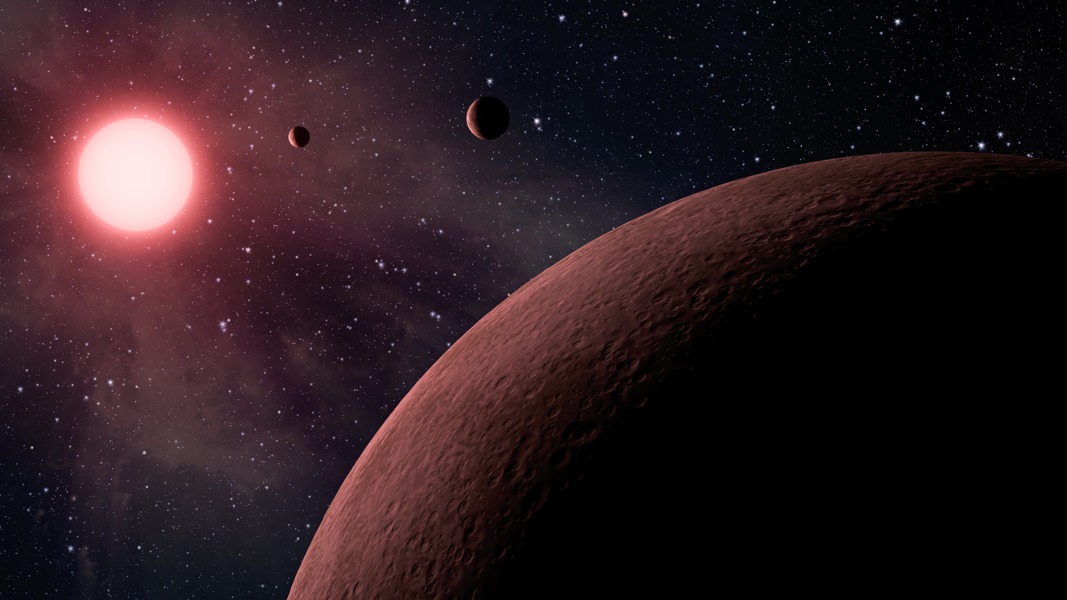 Artist's impression of Kepler M dwarf triple-planet system Kepler-42.
              Courtesy NASA/JPL-Caltech.